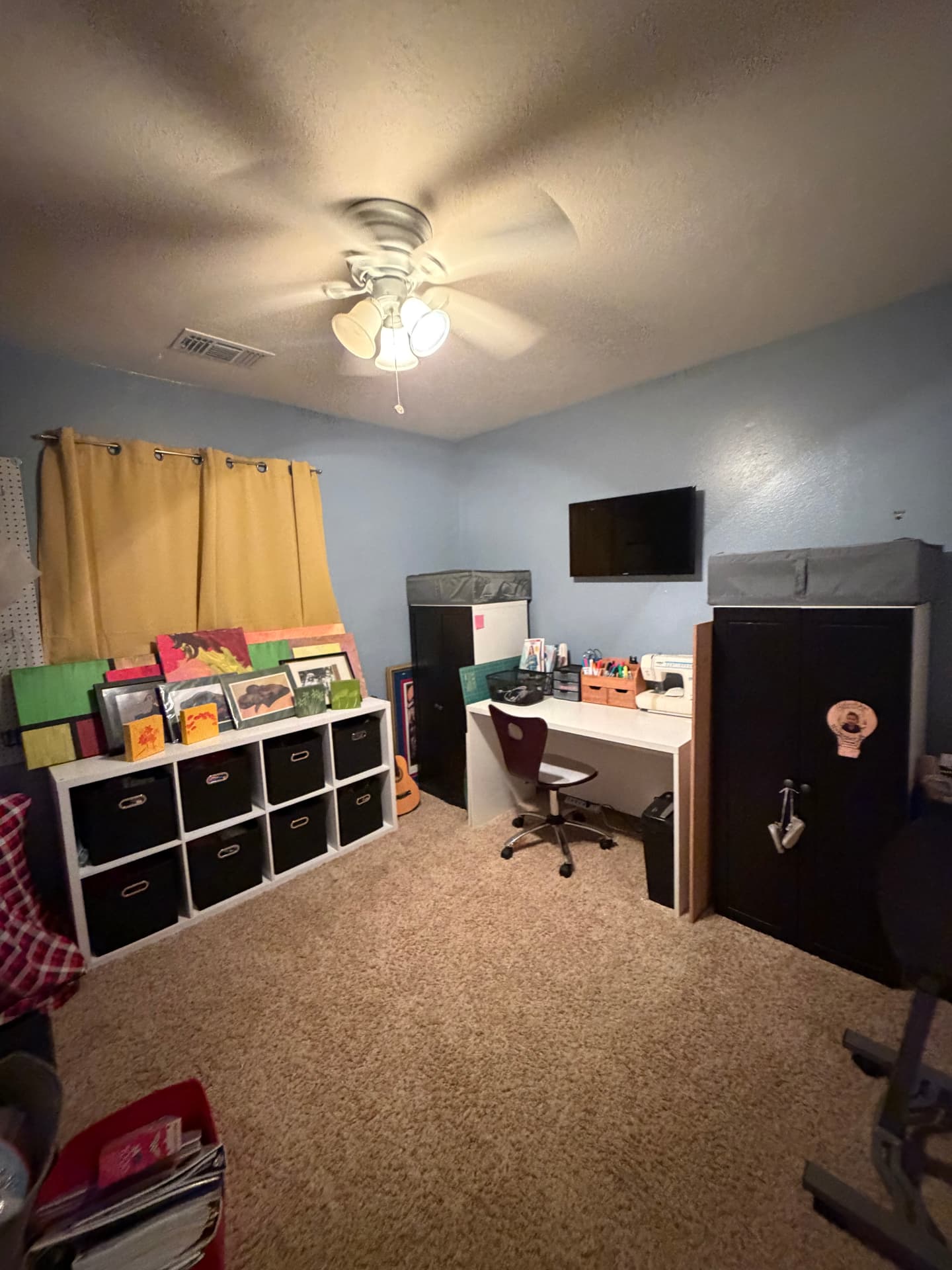 Playroom with cubby storage and a table
